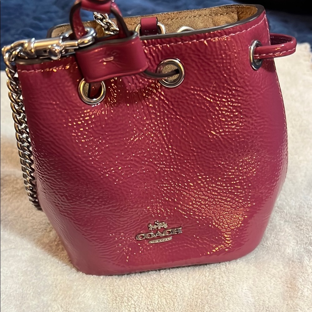 Coach Pink Mini Bag with silver hardware drawstring wristlet patent leather